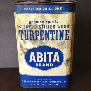 Vintage Abita brand turpentine bout half full